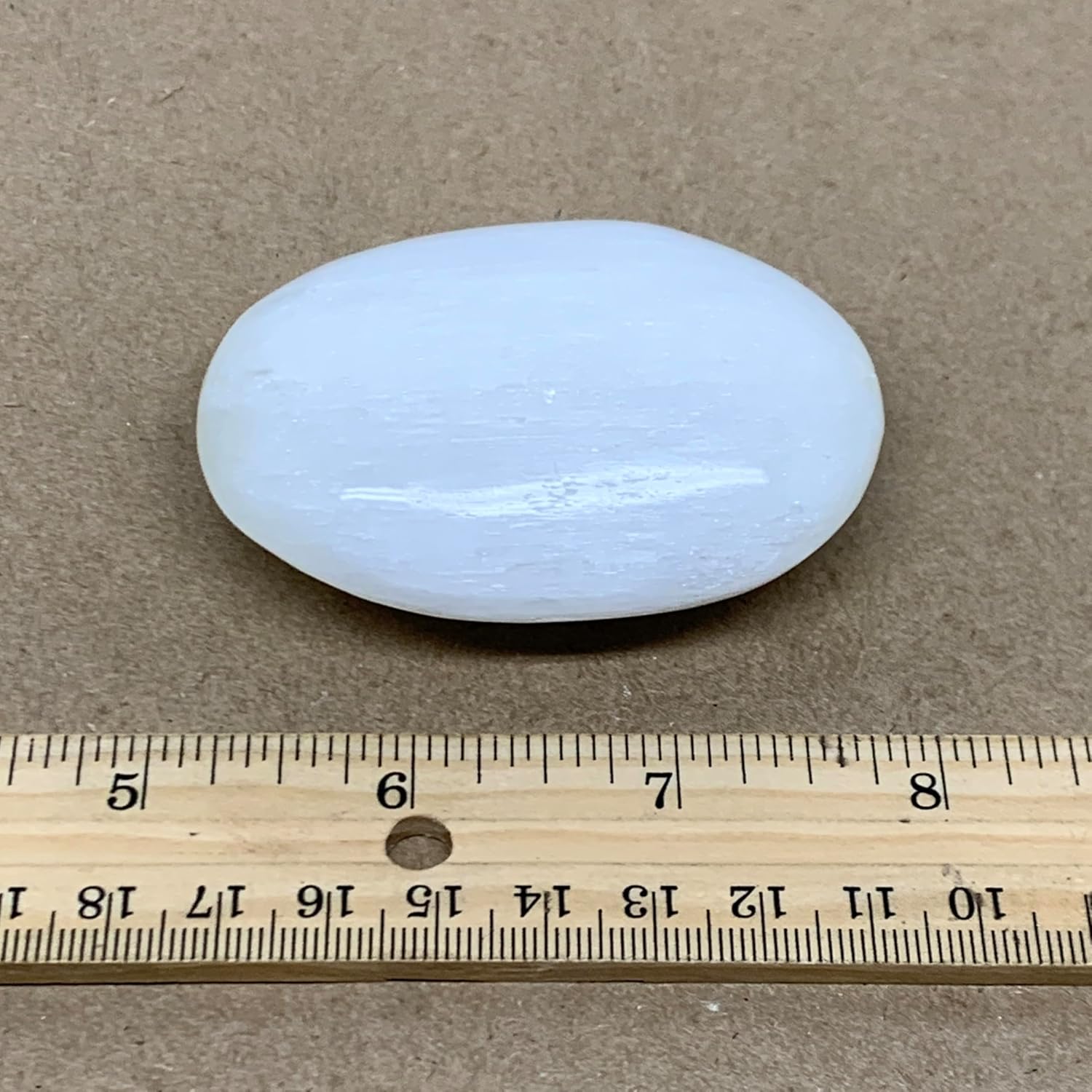 WatanGems 100g Natural Selenite Palmstone Crystal Pillow Shape