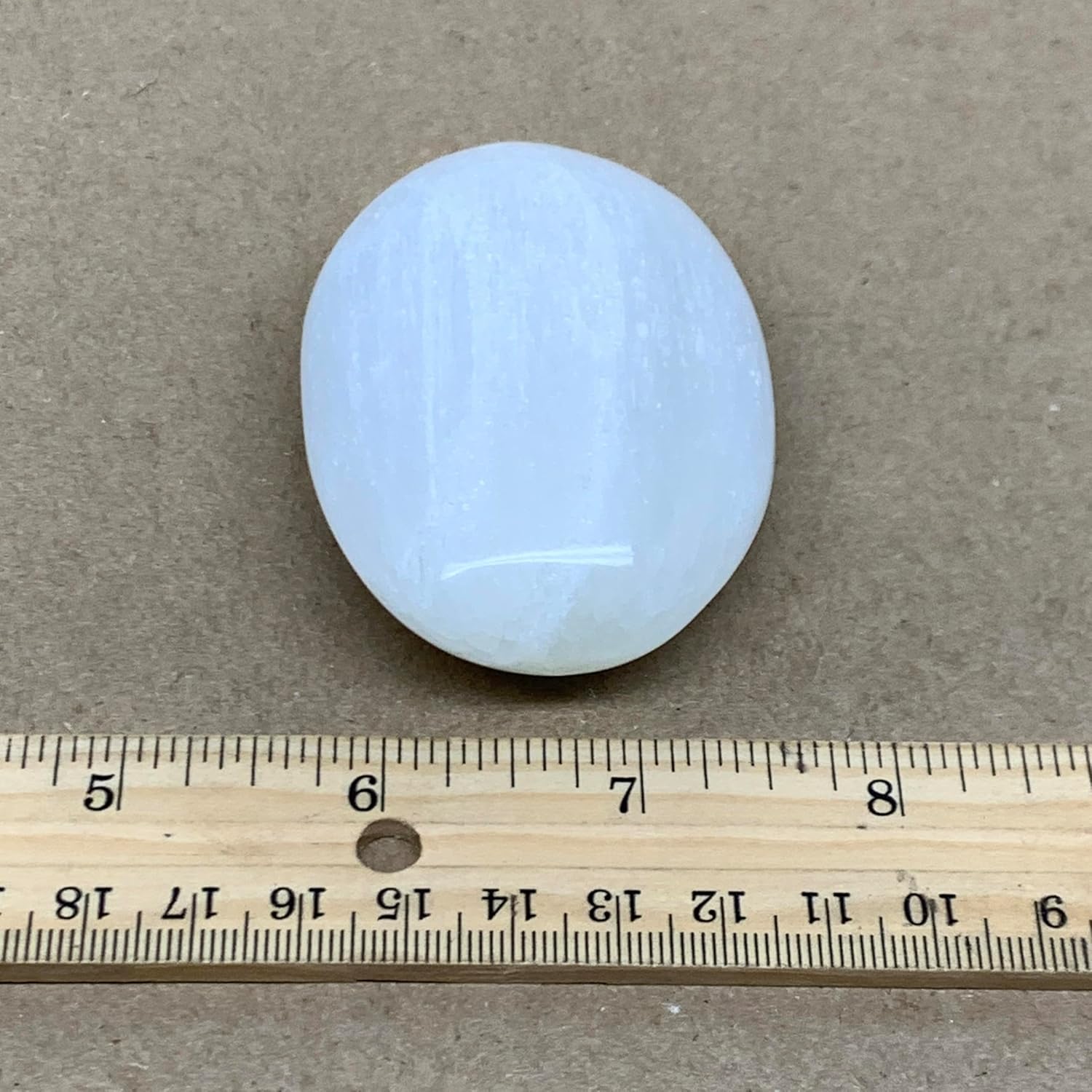 WatanGems 100g Natural Selenite Palmstone Crystal Pillow Shape