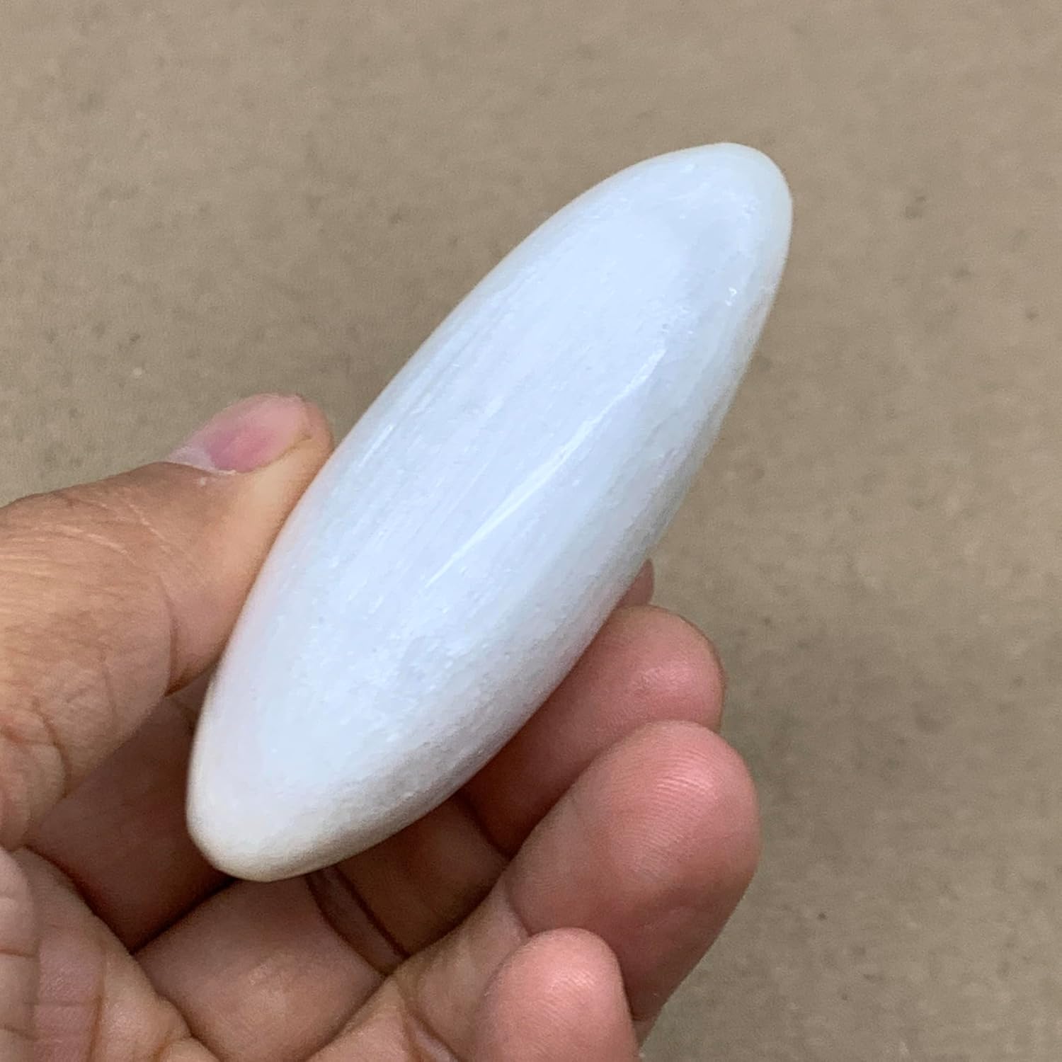 WatanGems 100g Natural Selenite Palmstone Crystal Pillow Shape